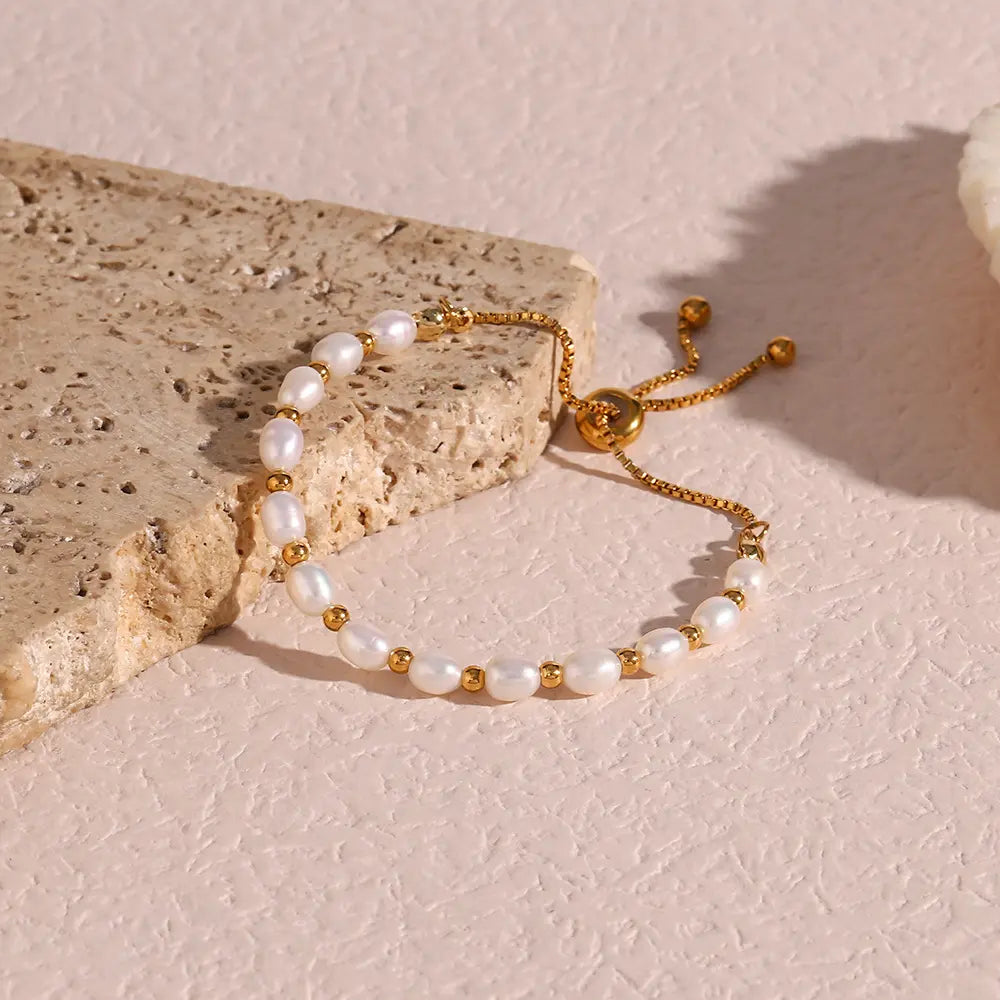 Elegant Pearl and Gold Bracelet