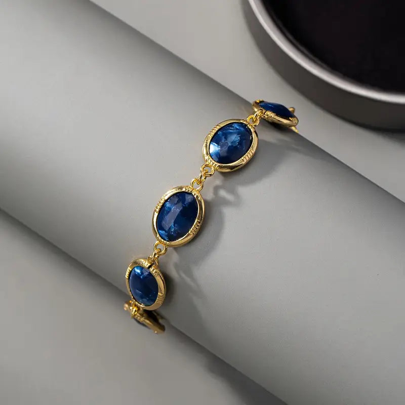 Charming Blue Stone Gold Bracelet