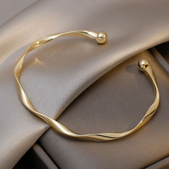 Elegant Twisted Gold Bracelet